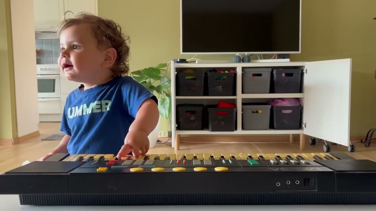 Frame from the video: hands on the keyboard keys