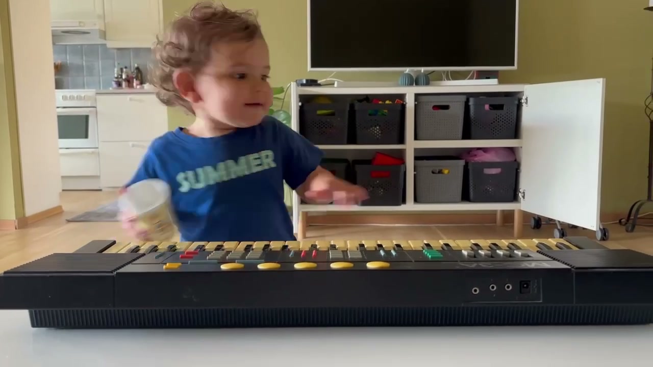 Frame from the video: the keyboard mid-performance